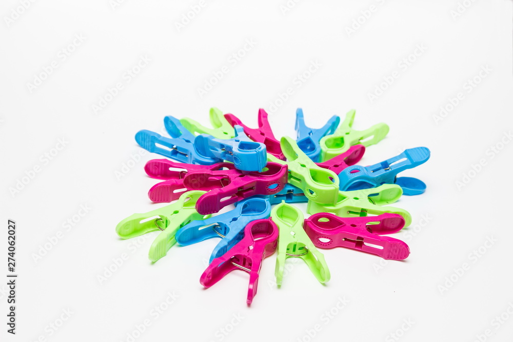 cool colorful clothespins on a white background cool colorful clothespins on a white background