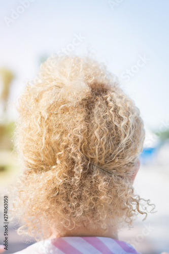 curly hair head back view