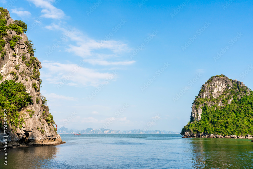 Beautiful scenery views cruising at Ha Long Bay, Hanoi, Vietnam.  blue sky background summer season sunset emerald waters ocean sea,  World Heritage Asia National Park Asian outdoors destinations