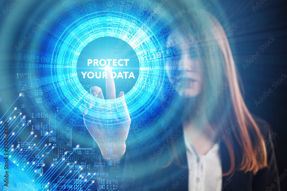 The concept of business, technology, the Internet and the network. A young entrepreneur working on a virtual screen of the future and sees the inscription: Protect your data The concept of business, technology, the Internet and the network. A young entrepreneur working on a virtual screen of the future and sees the inscription: Protect your data
