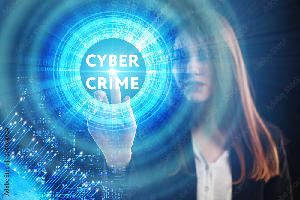 The concept of business, technology, the Internet and the network. A young entrepreneur working on a virtual screen of the future and sees the inscription: Cyber crime The concept of business, technology, the Internet and the network. A young entrepreneur working on a virtual screen of the future and sees the inscription: Cyber crime