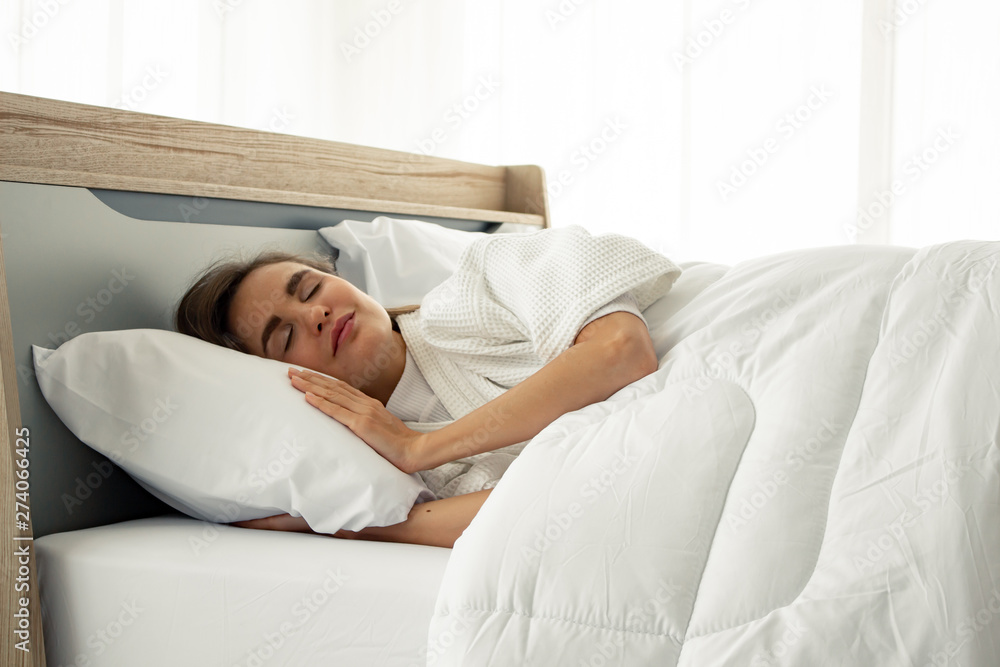 Young beautiful sleep in the bed at home. Young beautiful sleep in the bed at home.