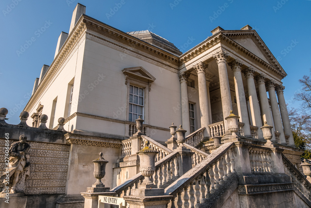 By the side of Chiswick House on West London, Uk. Chiswick House is a magnificent neo Palladian villa set in beautiful historic gardens. By the side of Chiswick House on West London, Uk. Chiswick House is a magnificent neo Palladian villa set in beautiful historic gardens.