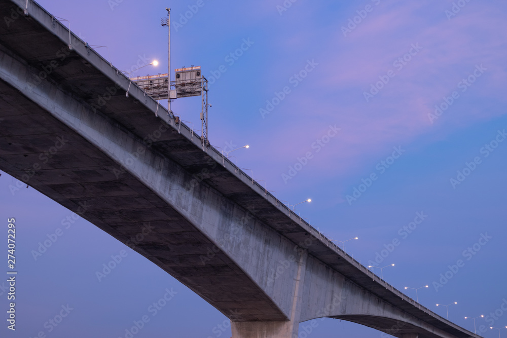 Under Rama3 bridge highway cross over Chao phraya river in evening Bangkok, Thailand. Bridge Cityscape and transportation Concept. Under Rama3 bridge highway cross over Chao phraya river in evening Bangkok, Thailand. Bridge Cityscape and transportation Concept.