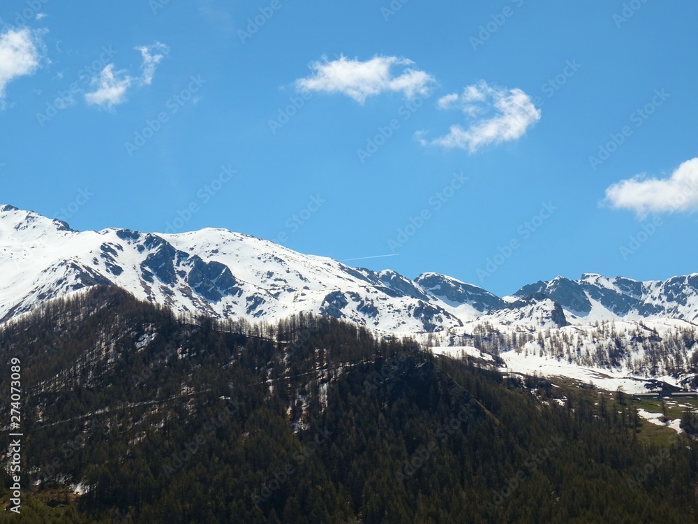 The mountains of the Italian Alps, in Val d'aosta, near the village of Chamois, Italy - June 2019.