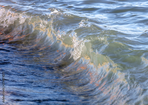 Waves on the seashore as an abstract background
