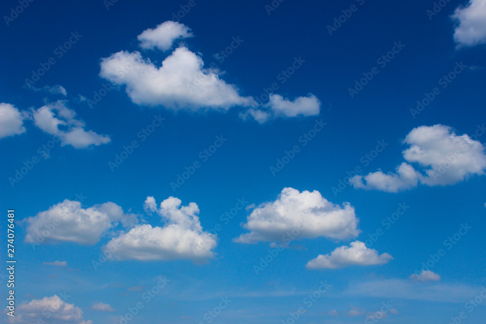 Beautiful Clouds Over Blue Sky Background. Nature, Landscape Concept. Beautiful Sky Background. Beautiful Clouds Over Blue Sky Background. Nature, Landscape Concept. Beautiful Sky Background.