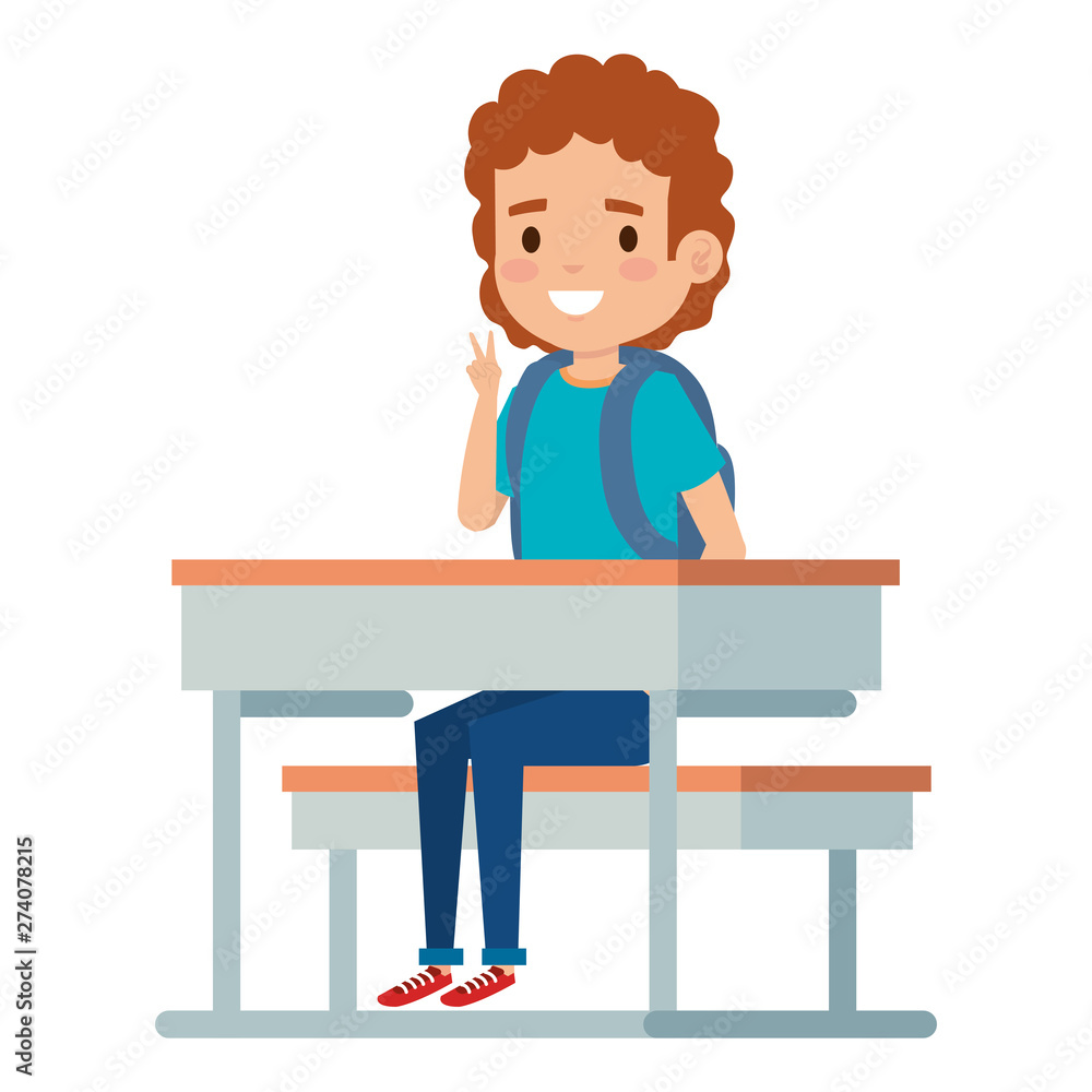 happy student boy seated in school desk happy student boy seated in school desk