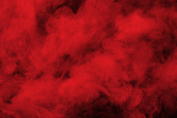 Abstract red smoke on black background. Red color clouds.