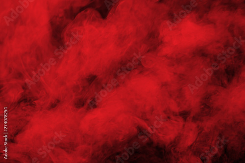 Abstract red smoke on black background. Red color clouds.