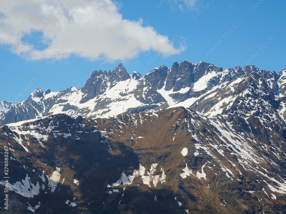 Obraz premium The mountains of the Italian Alps, in Val d'aosta, near the village of Chamois, Italy - June 2019.