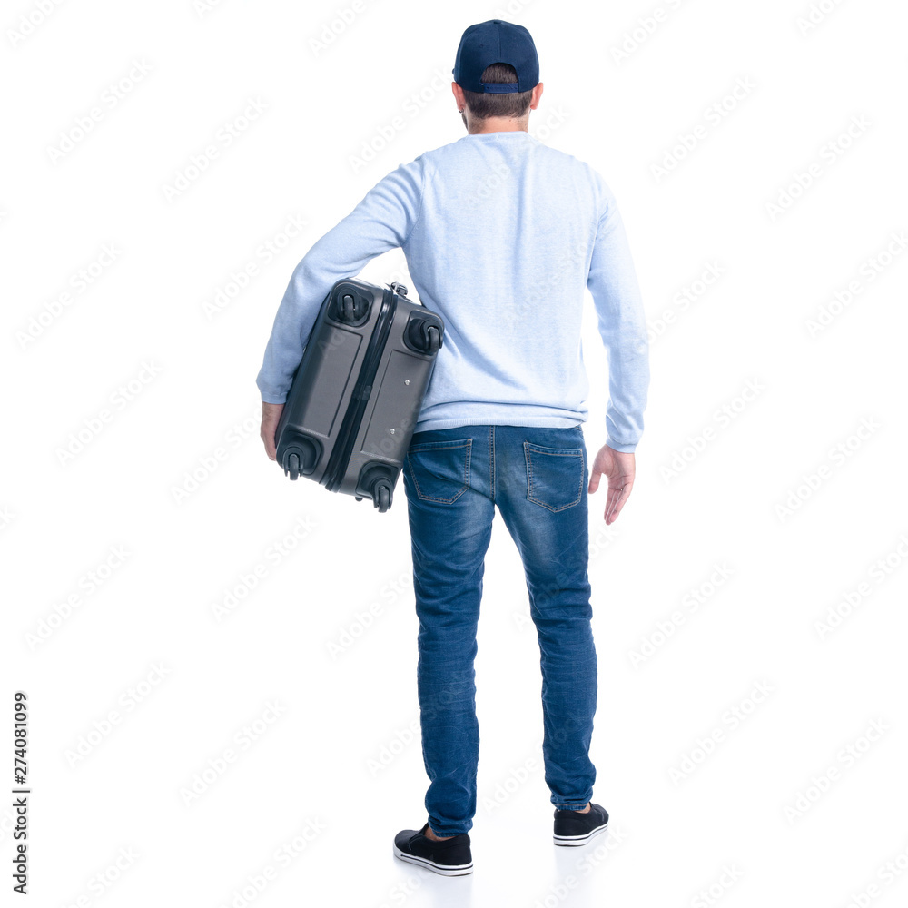 Man in jeans holding travel suitcase standing on white background isolation, back view Man in jeans holding travel suitcase standing on white background isolation, back view