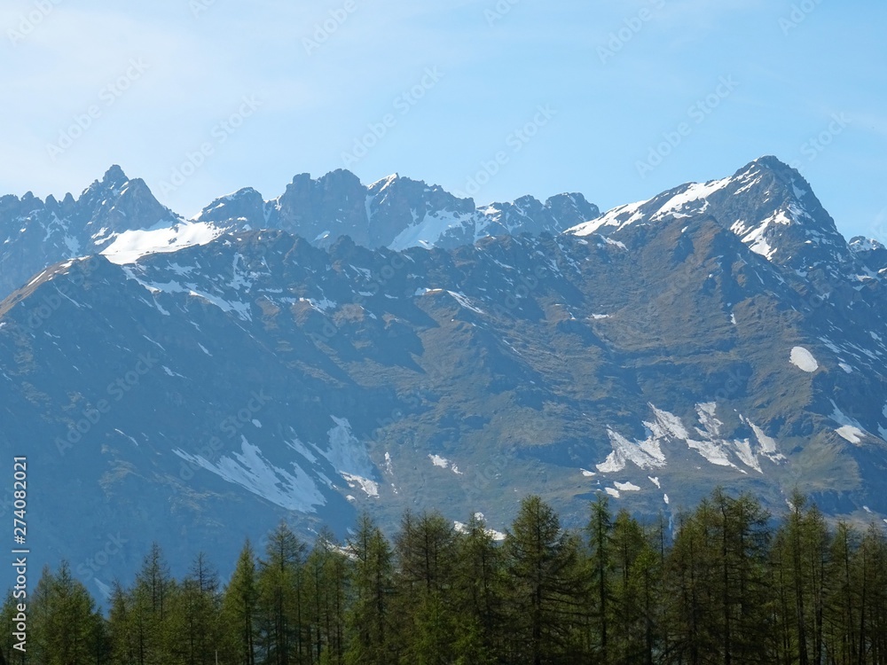 The mountains of the Italian Alps, in Val d'aosta, near the village of Chamois, Italy - June 2019.