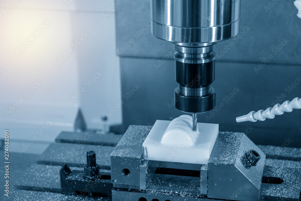 The CNC milling machine cutting the resin parts with solid ball endmill tool.The hi-precision parts cutting by machining centre. The CNC milling machine cutting the resin parts with solid ball endmill tool.The hi-precision parts cutting by machining centre.