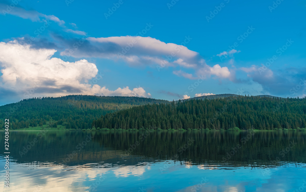 landscape with mountain lake and clouds