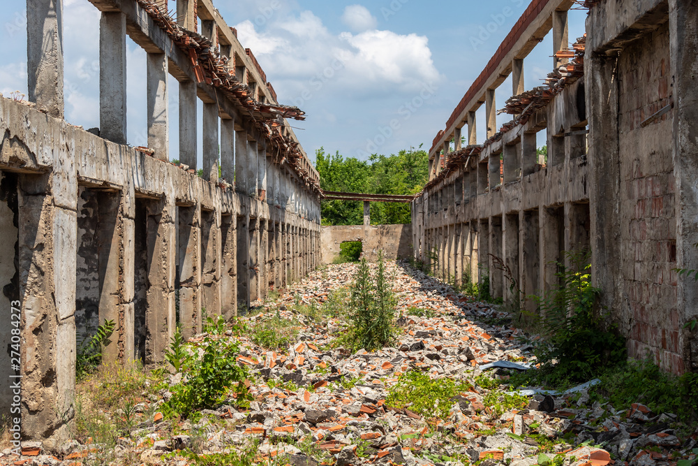Construction Columns and Beams in Heavily Damaged and Ruined Abandoned Building Construction Columns and Beams in Heavily Damaged and Ruined Abandoned Building