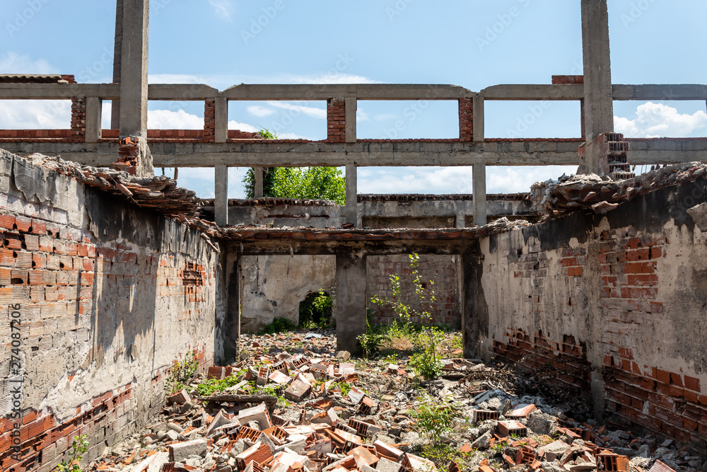 Construction Red Brick Walls, Columns and Beams in Heavily Damaged and Ruined Abandoned Building Construction Red Brick Walls, Columns and Beams in Heavily Damaged and Ruined Abandoned Building