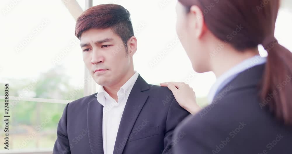 Businesswoman console her colleague Businesswoman console her colleague