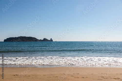 Island view from the beach on sunny day - Medes Islands