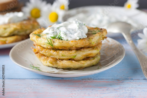 Pancakes from zucchini. Vegetarian vegetable patties or pancakes.