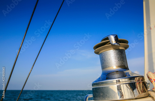 Close up on shiny winch on a luxury yacht (selective focus)