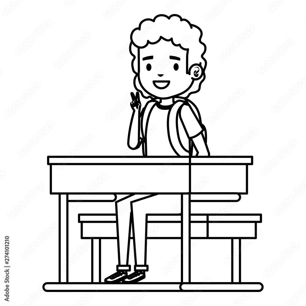 happy student boy seated in school desk happy student boy seated in school desk