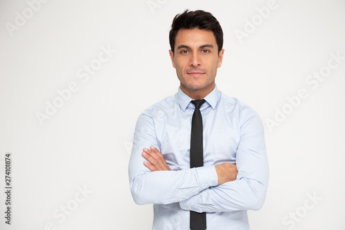 Portrait of Businessman with arms crossed isolated over white background, Looking at camera concept