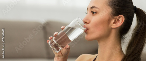 Healthy Liquid. Woman Drinking Cold Still Water From Glass