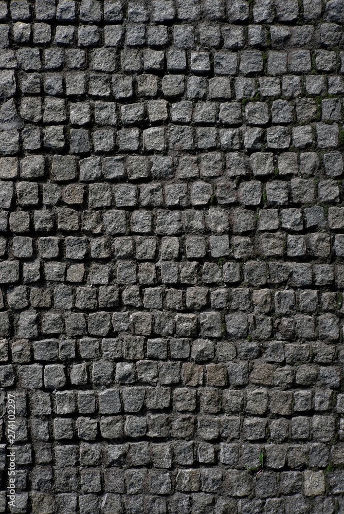 The texture of a square stone. Antique stonework. Pattern stone background The texture of a square stone. Antique stonework. Pattern stone background