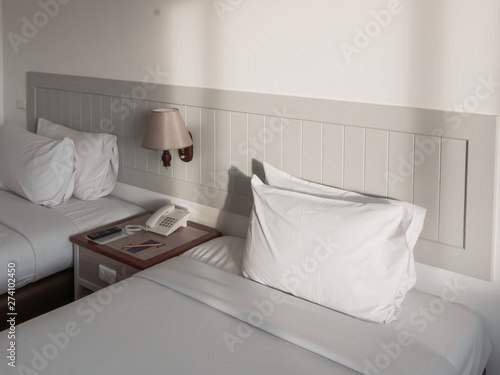 Twin beds in hotel room
