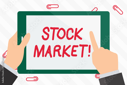 Text sign showing Stock Market. Business photo showcasing collection markets exchanges where activities of buying selling Hand Holding Pointing Touching Blank Rectangular Color Tablet White Screen