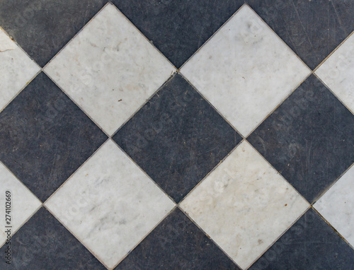 Black and white wintage checkered floor tiles.
