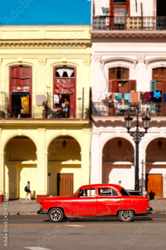 Classic car and colorful buildings in Old Havana