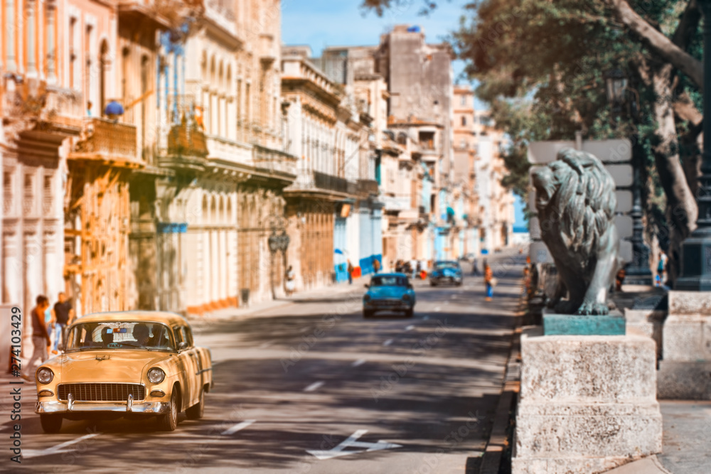 Antique cars at the famous Prado avenue in Old Havana