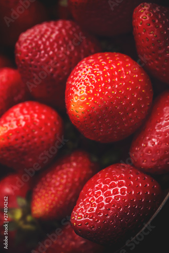 Red Strawberry on the dark background