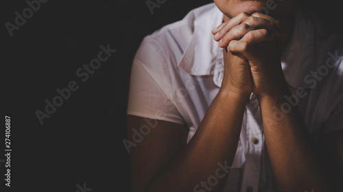 Christian life crisis prayer to god. Woman Pray for god blessing to wishing have a better life. woman hands praying to god with the bible. begging for forgiveness and believe in goodness.