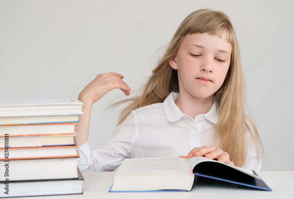 An excellent student looks for information in books. An excellent student looks for information in books.