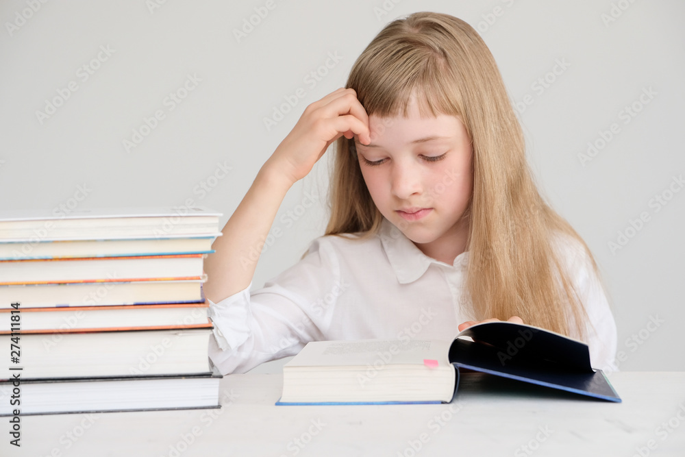 An excellent student looks for information in books. An excellent student looks for information in books.