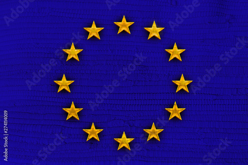 blue EU flag on woven woven fabric texture