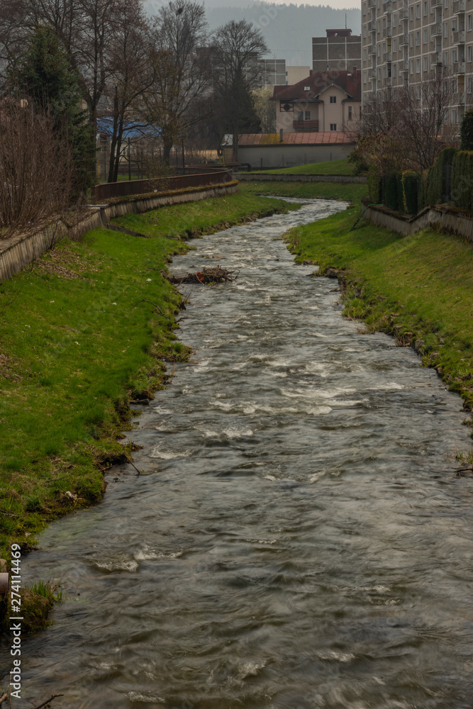 Svatava river in Kraslice town in Krusne mountains in spring day