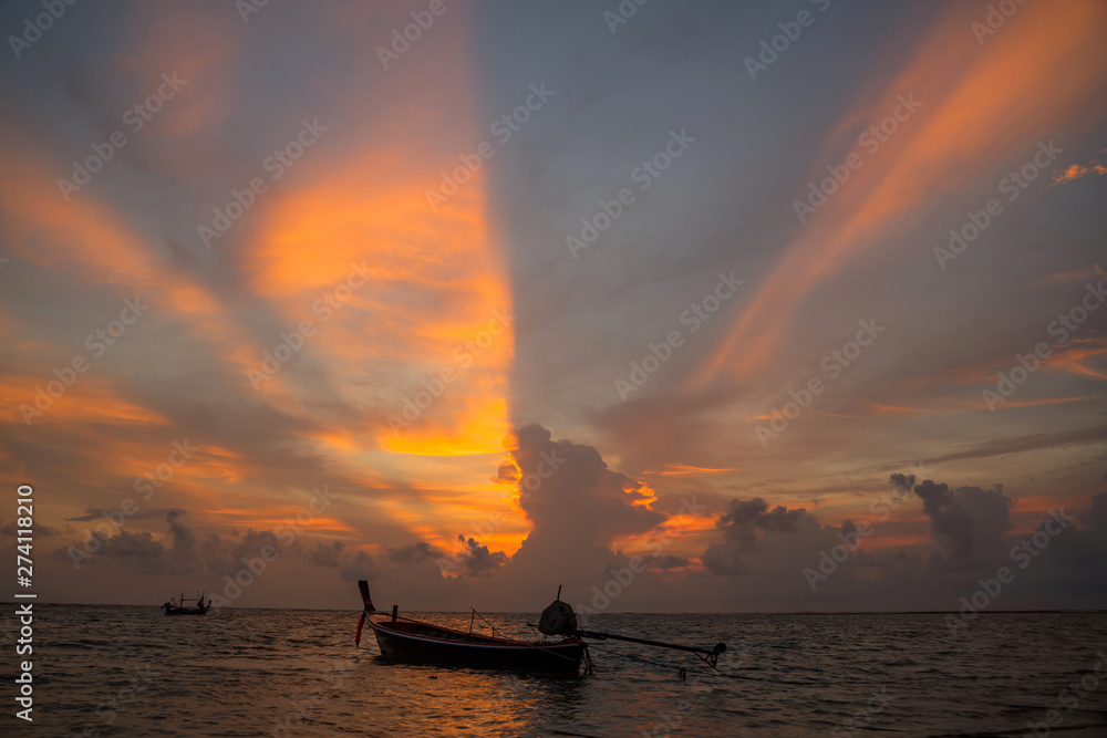 Good evening background sky and Thai boat, Beach near Phuket International Airport ,Bright in Phuket Thailand. Good evening background sky and Thai boat, Beach near Phuket International Airport ,Bright in Phuket Thailand.