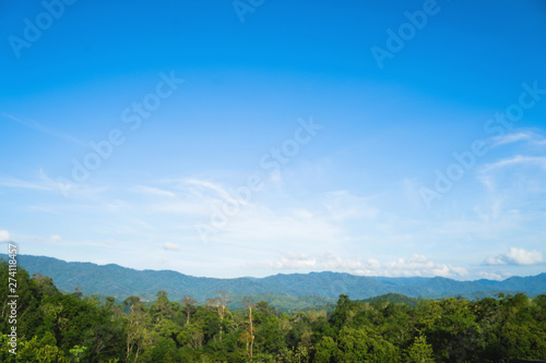 Morning green mountains, isolated on a bright sky background, at Narathiwat, Thailand