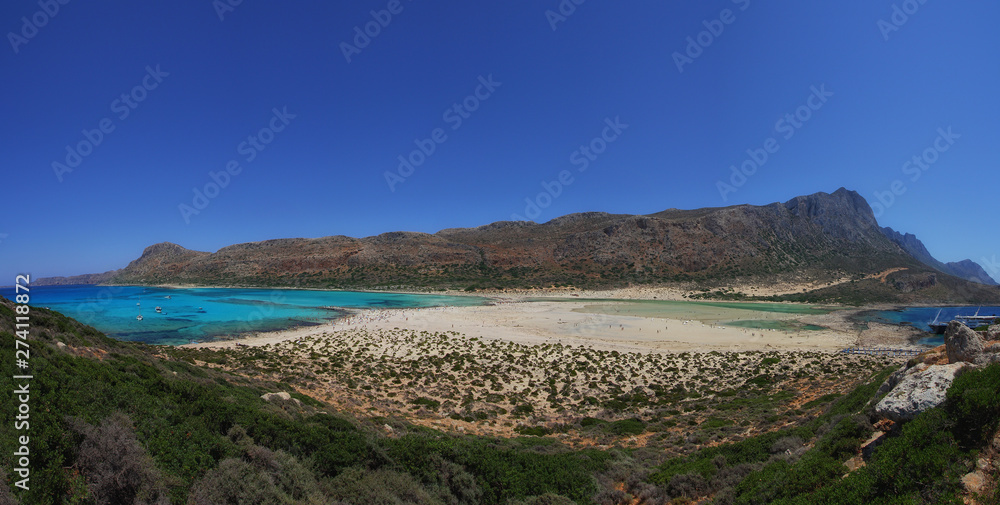 Aerial panoramic view of Balos beach on Crete island, Greece. Crystal clear water and white sand. Travel background Aerial panoramic view of Balos beach on Crete island, Greece. Crystal clear water and white sand. Travel background