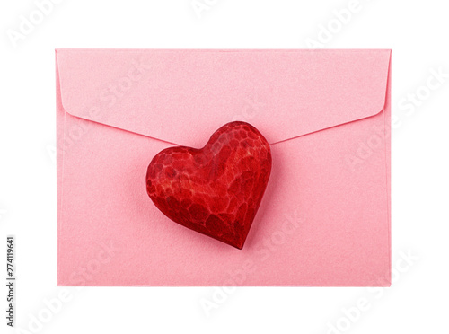 Red wooden heart on envelope isolated on white © breakingthewalls