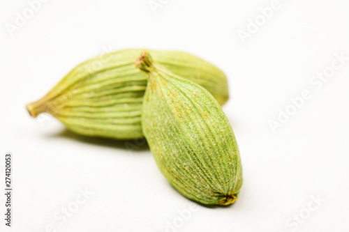 closuep of cardamom on white background photo