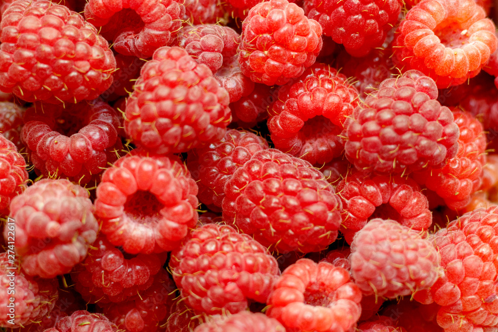 Heap of sweet red raspberries close up for bckground Heap of sweet red raspberries close up for bckground