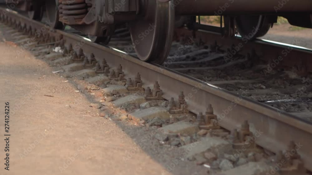 Railway rails and sleepers in summer sunny day. Close-up. Railroad track Railway rails and sleepers in summer sunny day. Close-up. Railroad track