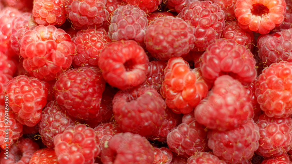 Heap of sweet red raspberries close up for background Heap of sweet red raspberries close up for background