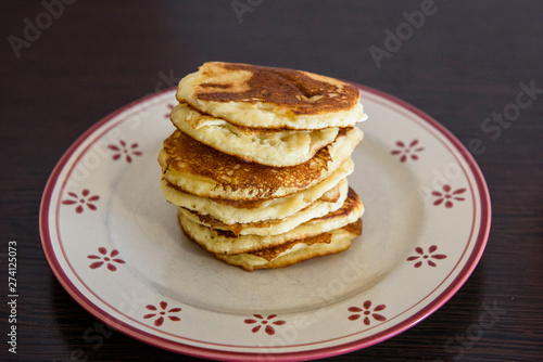 Stack of Homemade pancakes on plate.