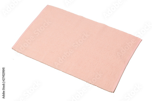 Foto pink cotton placemat isolated on white background.